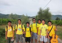A group of young men standing together, symbolizing